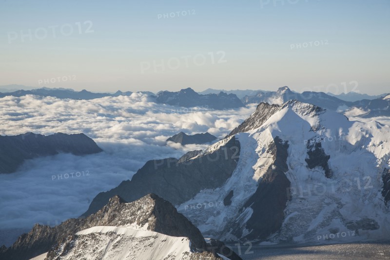 Snowy mountaintops in remote landscape