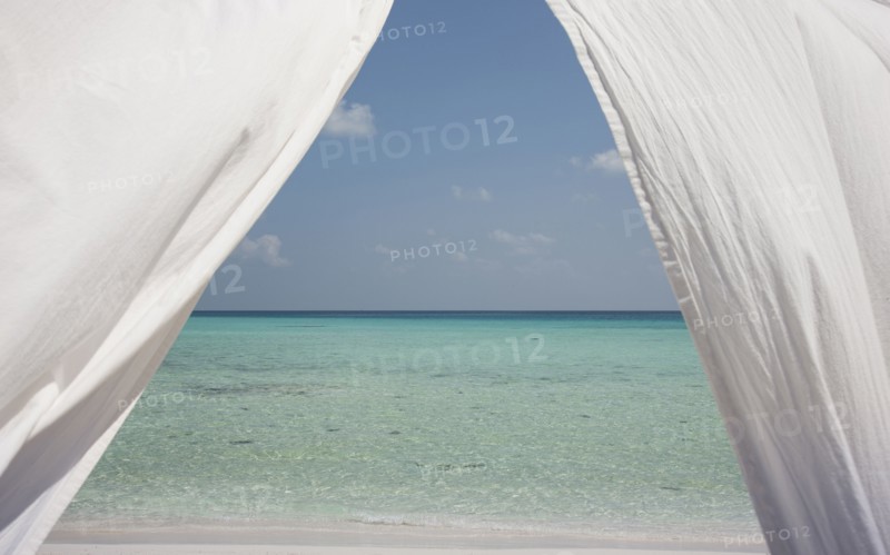 Curtains over ocean seascape