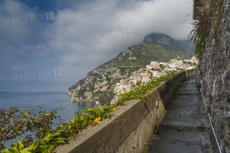 Rocky balcony overlooking Positano cityscape