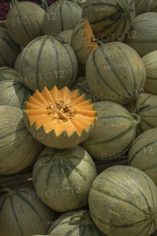 Sliced cantaloupe in pile