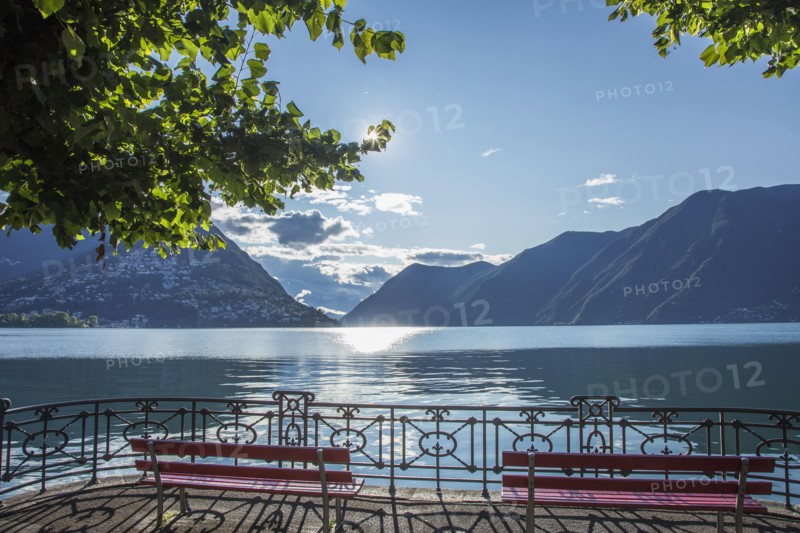 Benches overlooking mountains and remote lake
