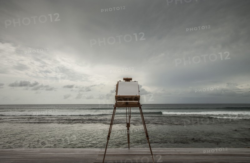 Vintage camera photographing seascape