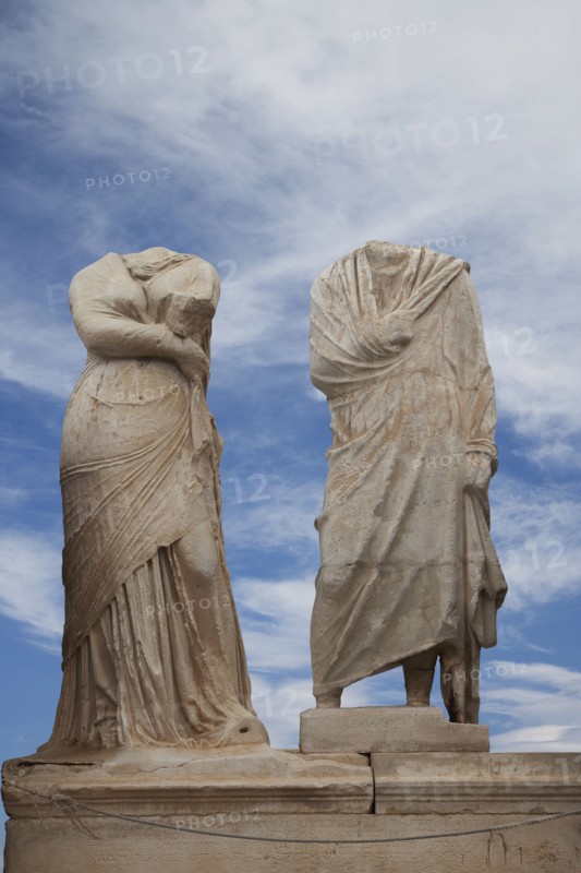 Low angle view of dilapidated statue ruins