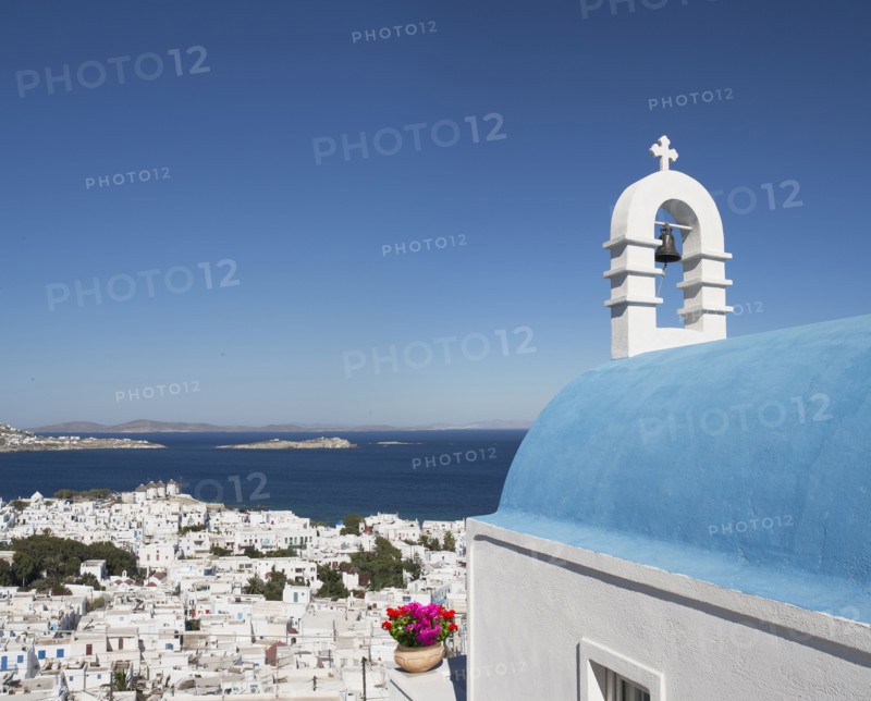 Traditional church and Mykonos cityscape