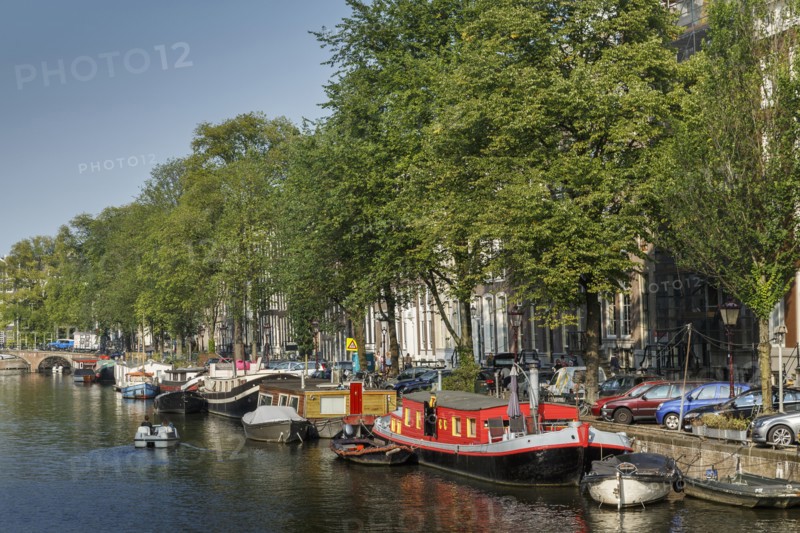Ornate building and boats along canal