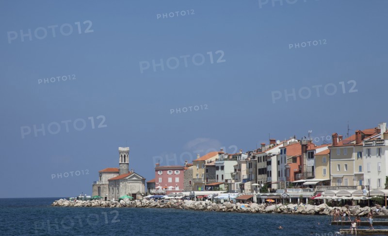 Piran waterfront under blue sky