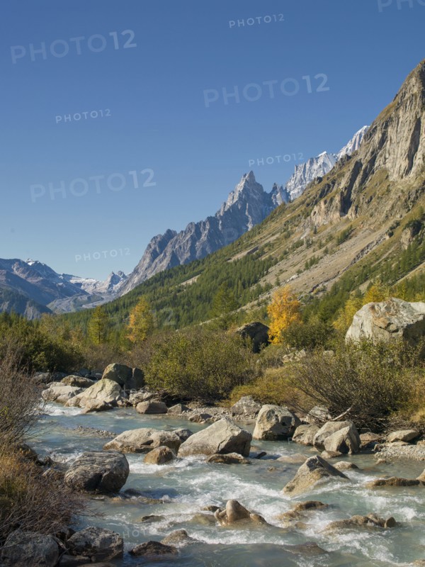 River and mountains in remote landscape