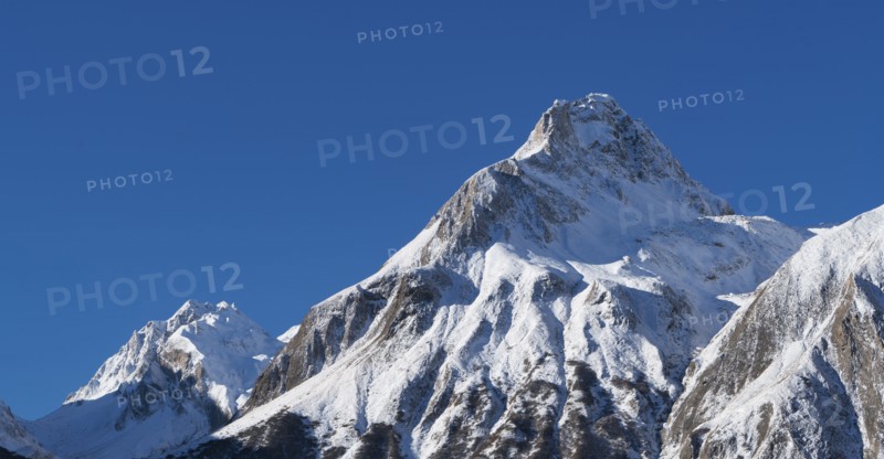 Snow on mountain range