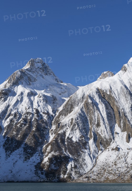 Snow on mountain range