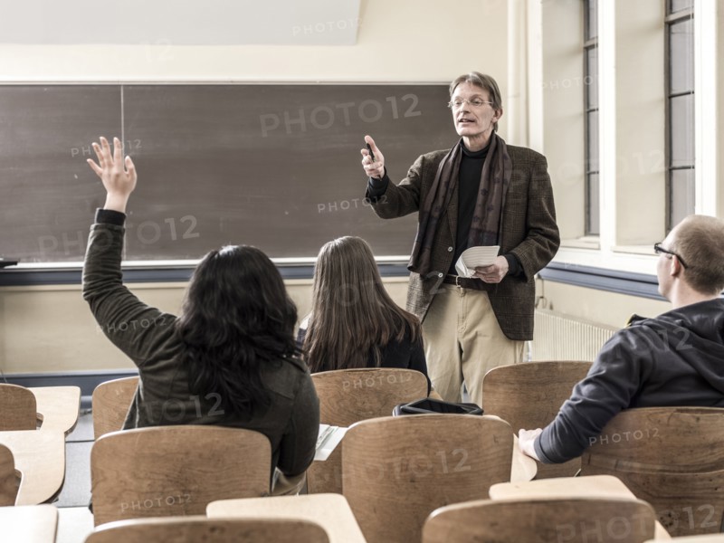 Teacher talking to students in classroom
