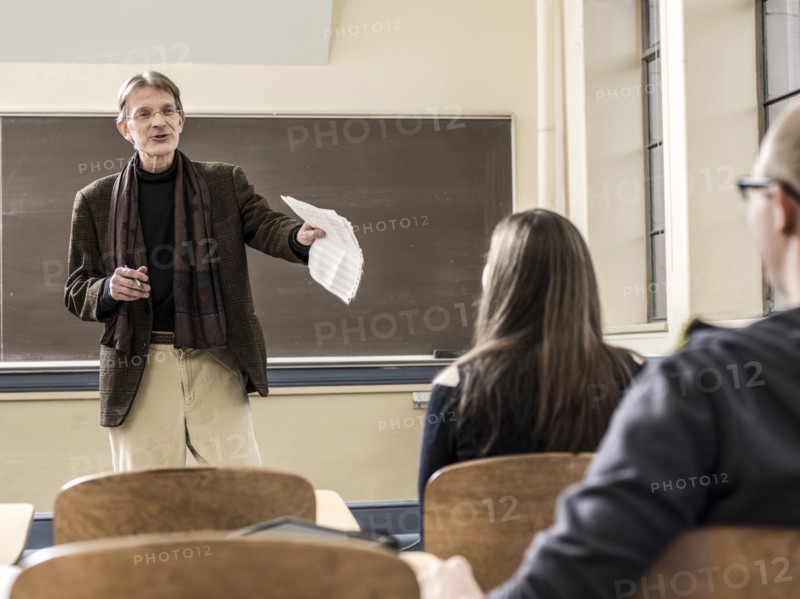 Teacher talking to students in classroom