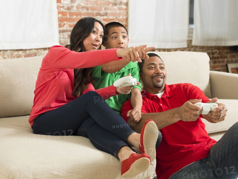 Family playing video games together