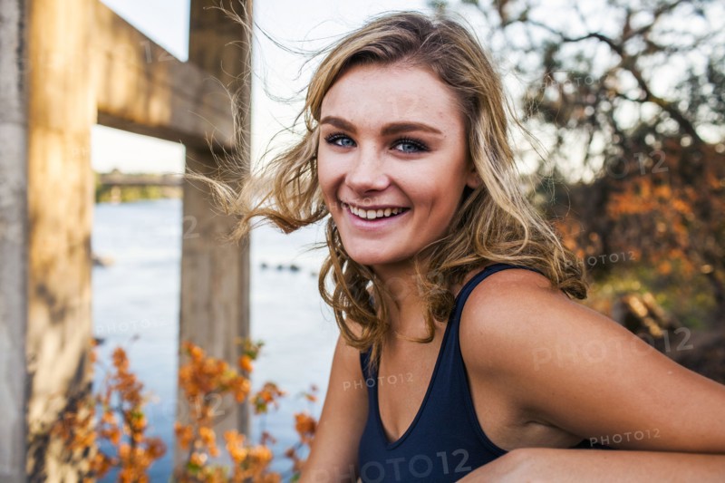 Caucasian teenage girl smiling outdoors