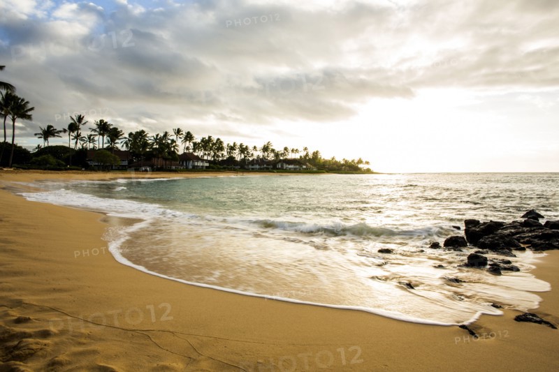 Ocean waves washing up on tropical beach