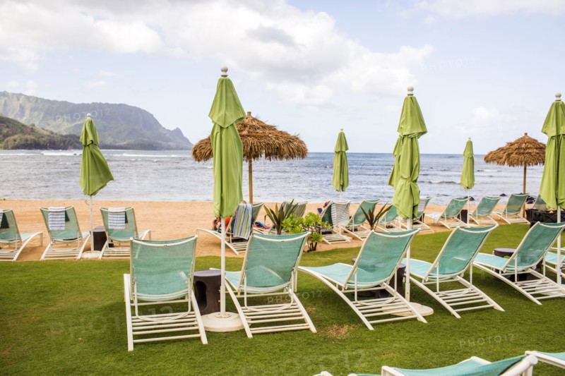 Empty deck chairs on beach