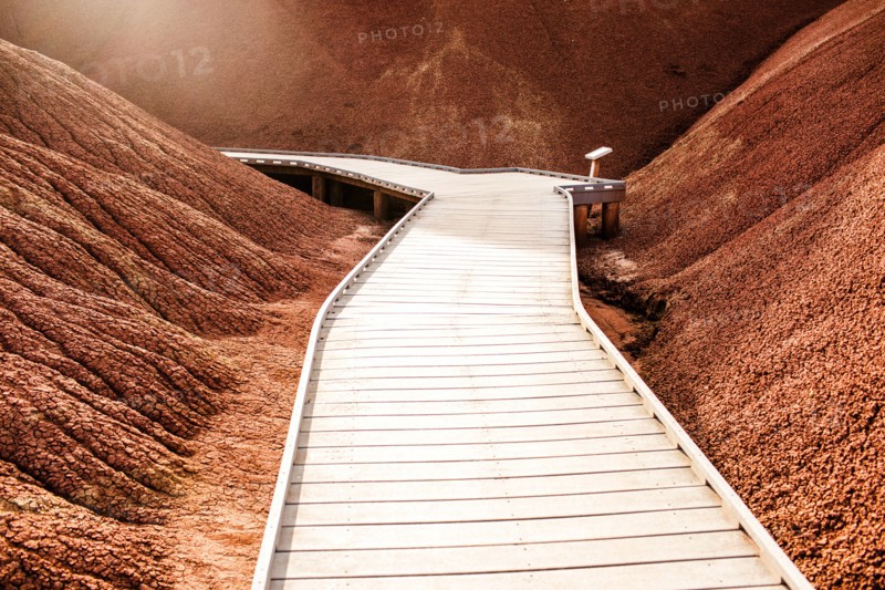 Wooden walkway in desert hills