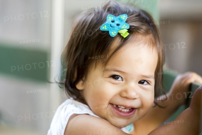 Caucasian baby girl smiling