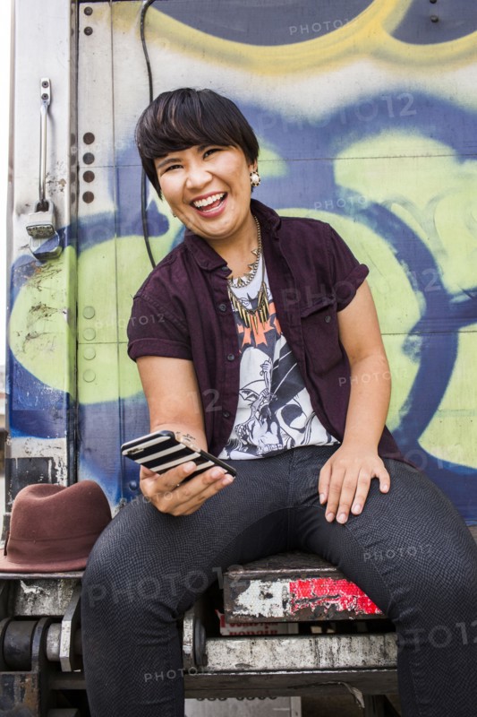Asian woman using cell phone