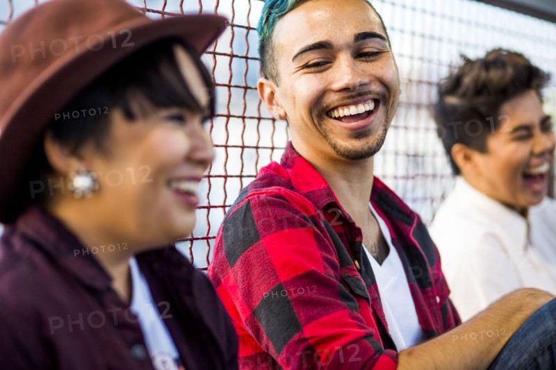 Friends laughing outdoors