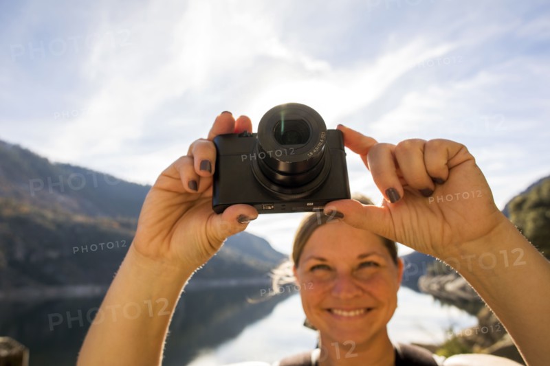 Caucasian woman photographing in Yosemite National Park