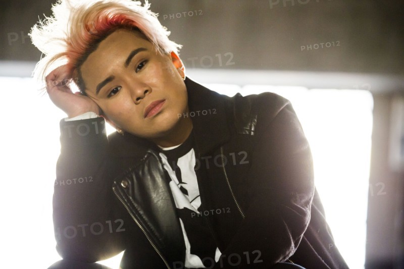 Portrait of serious androgynous Asian woman