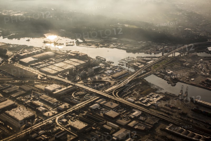 Aerial view of bridge over urban river