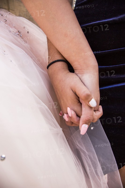 Hispanic girls holding hands