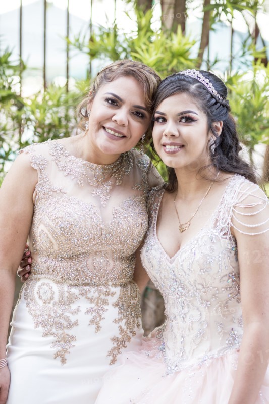 Portrait of Hispanic girl and mother