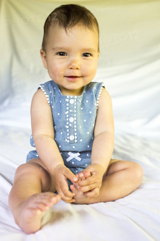 Portrait of smiling mixed race baby girl
