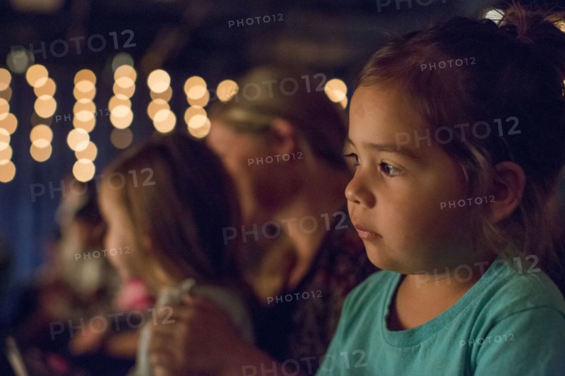 Curious girl looking away
