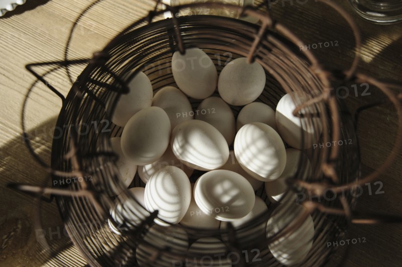 Close up of wire basket of eggs