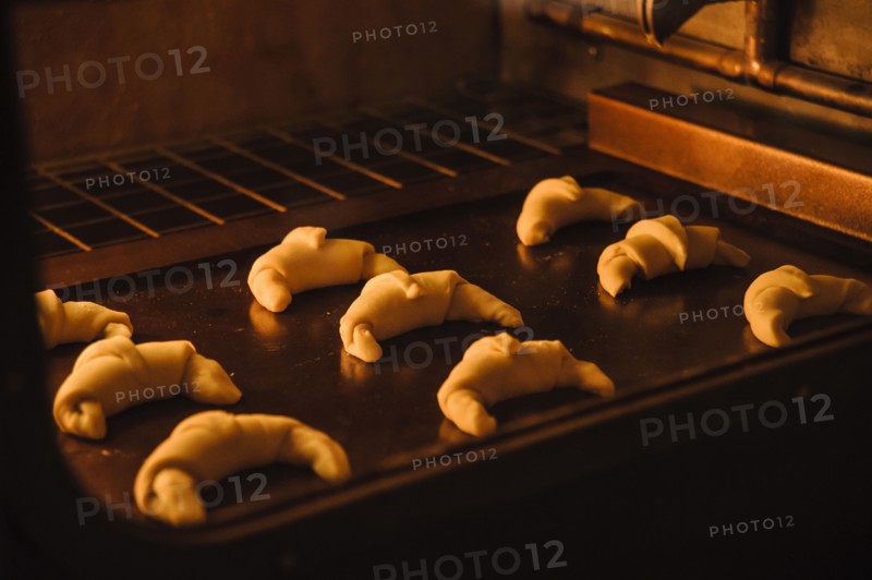 Close up of rolls baking in oven