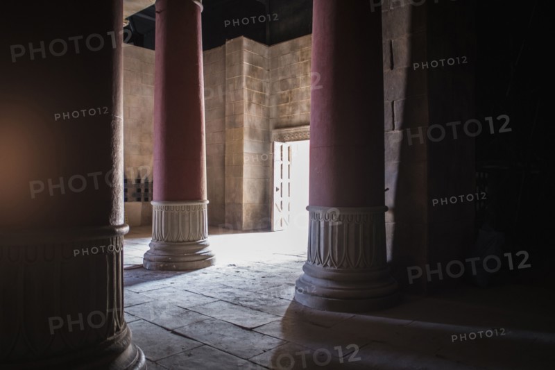 Open door and pillars in ancient building