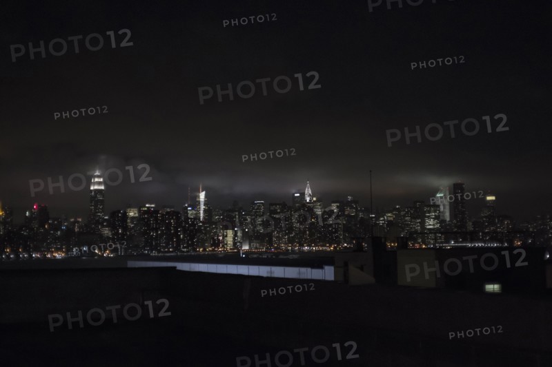 Illuminated New York City skyline at night