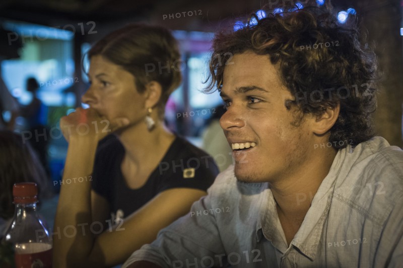 Caucasian mother and son in restaurant