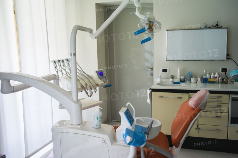 Empty chair in office of dentist