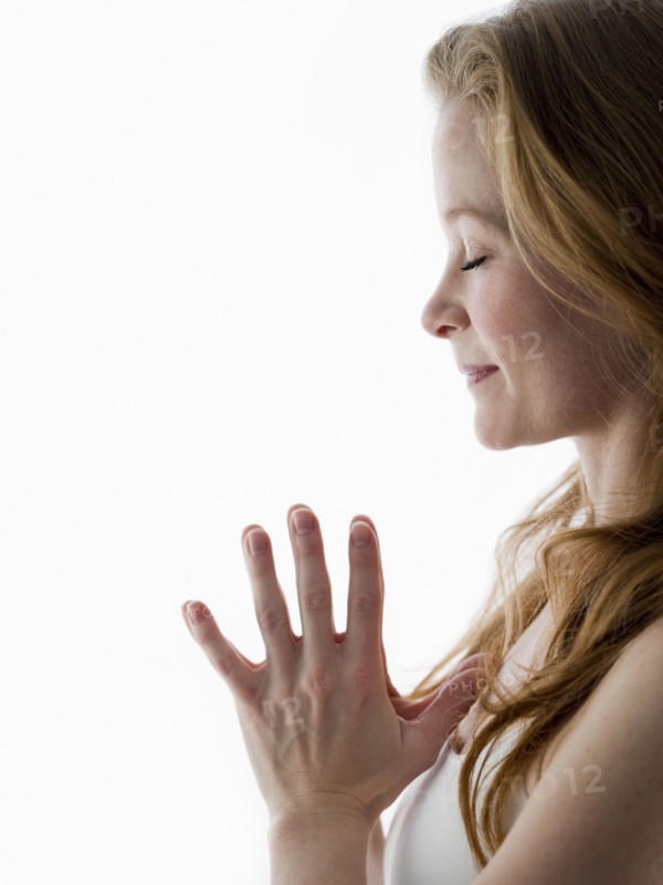 Close up of Caucasian woman meditating