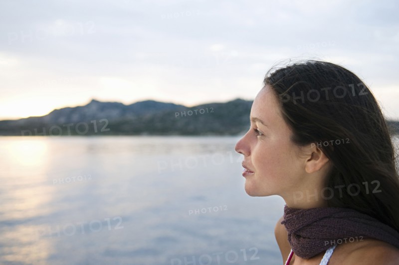Close up of woman overlooking ocean