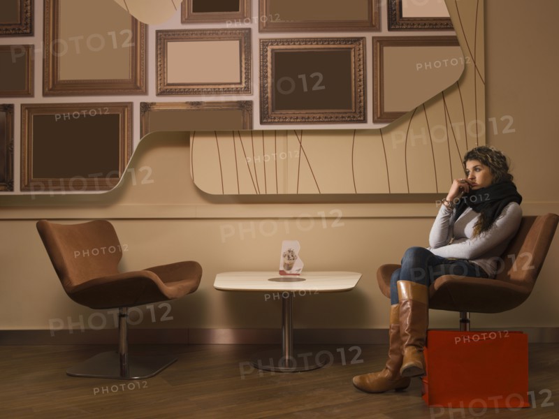 Woman sitting in waiting area