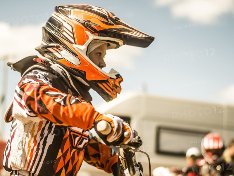 Caucasian motocross biker ready for race