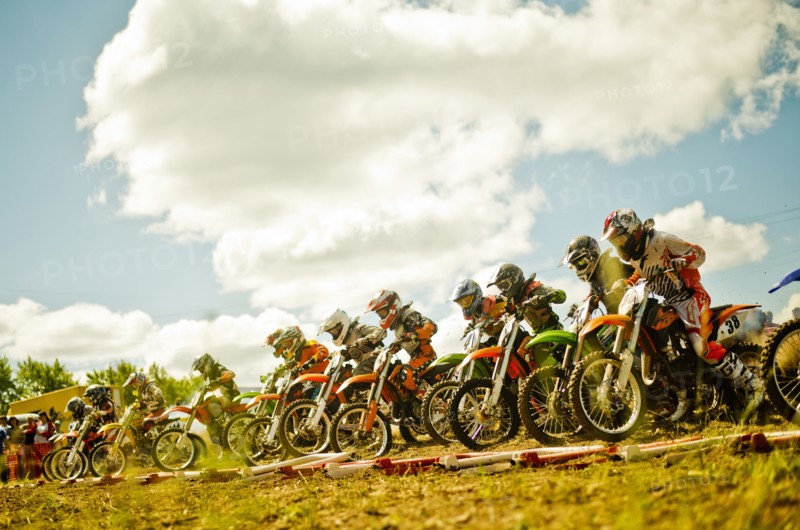 Caucasian motocross bikers ready for race