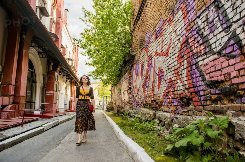 Caucasian woman walking in city street