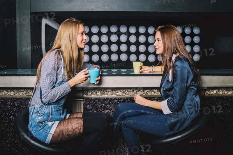 Women talking in coffee shop