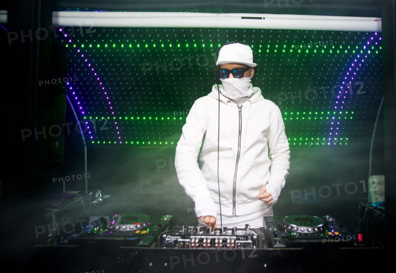 DJ playing music in nightclub