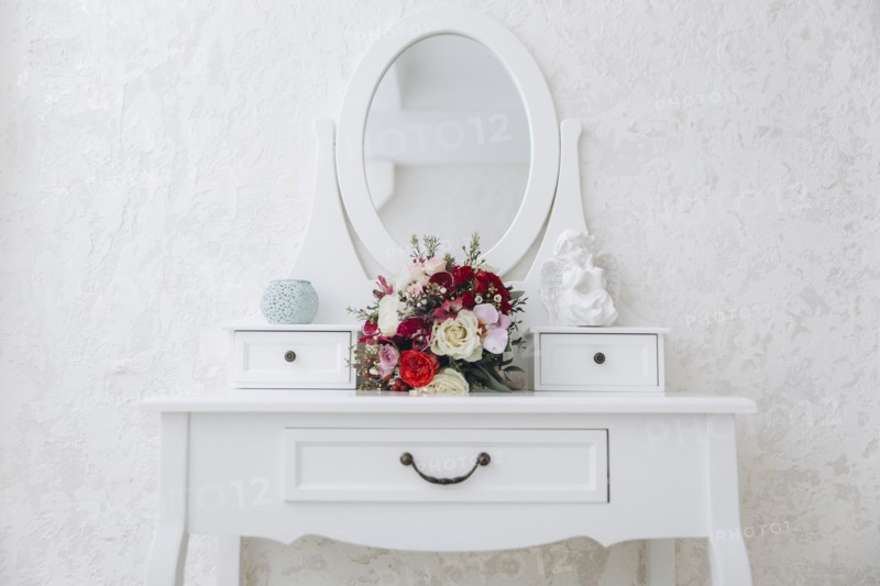 Bouquet of flowers on white vanity