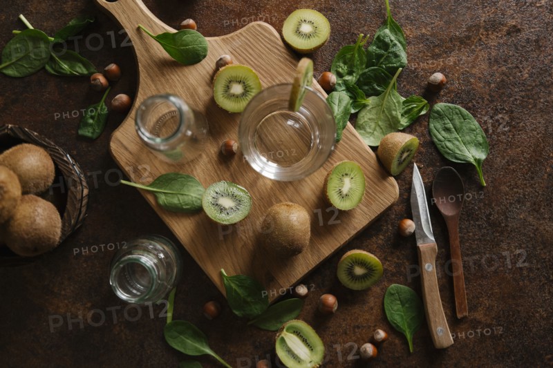 Sliced kiwi on cutting board