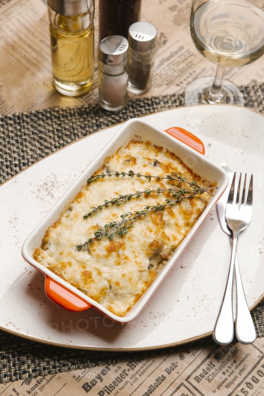 Rosemary on casserole in pan