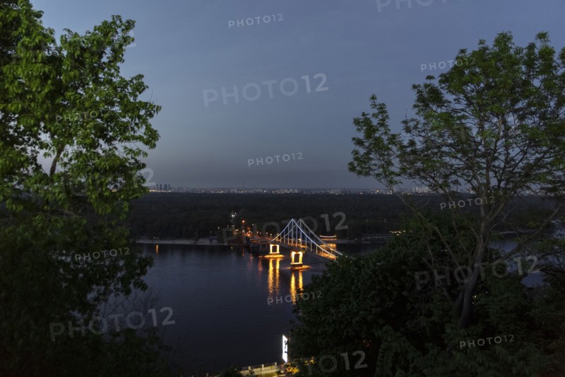 Scenic view of bridge over river at night