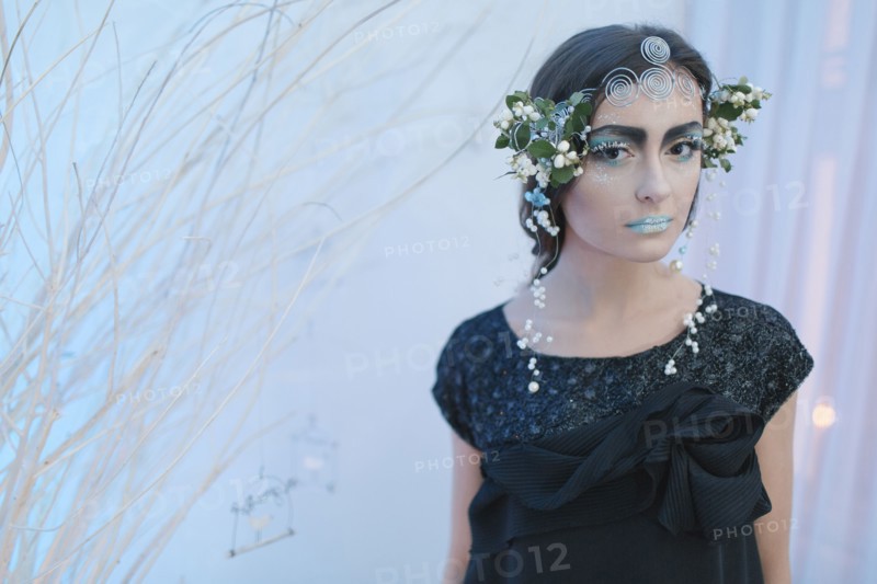 Ethereal woman wearing dress and makeup