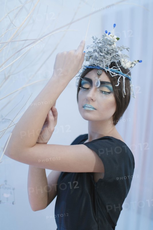 Ethereal woman wearing dress and makeup